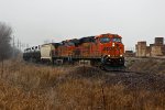 BNSF 7568 heads SB with a loaded Oil train.